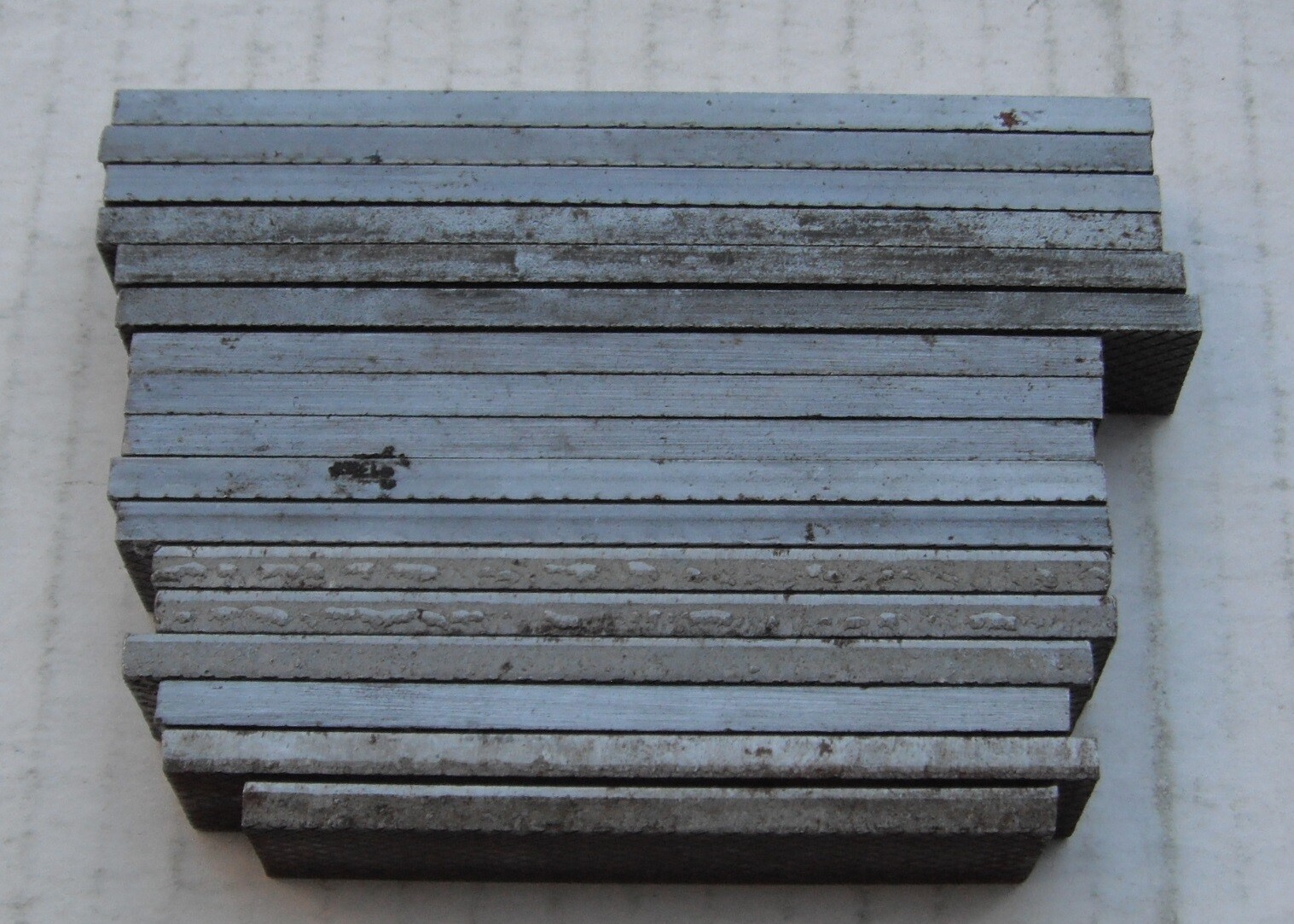 Steel–older flat stock..26 small pieces..3/16″ to 3/8″ thickness..4-5 lbs…er