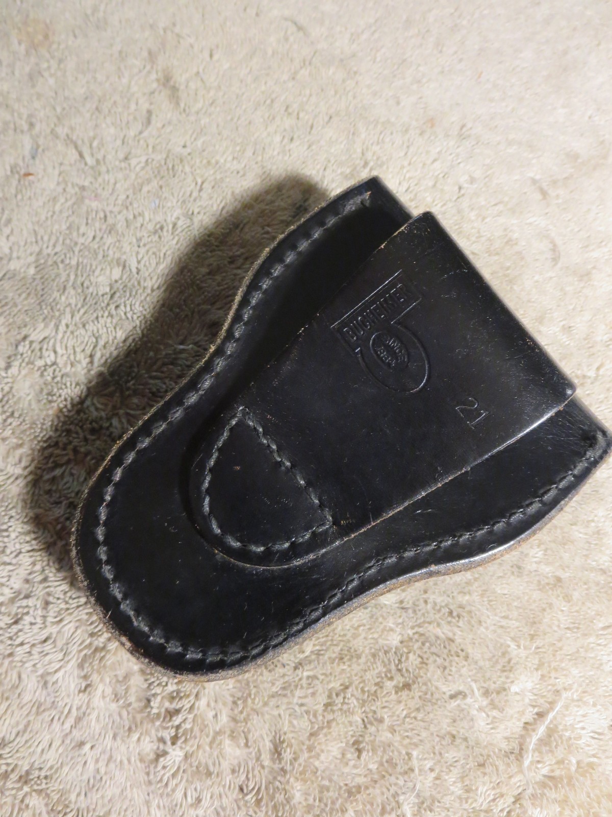 4 handcuff cases: 3 brand names in excellent cond. 1 older, modified, no name.