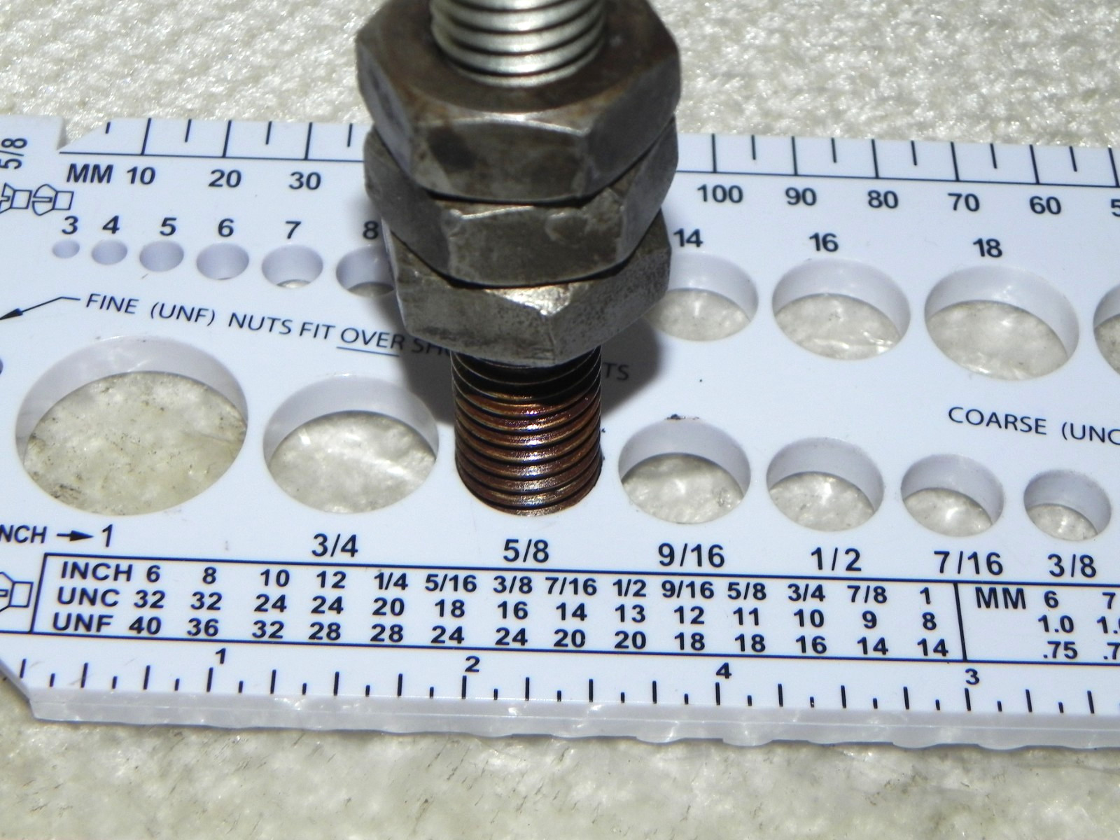 1) 5/8-11 x 8″ Stud with 7 nuts, this could be bolt with head cut off