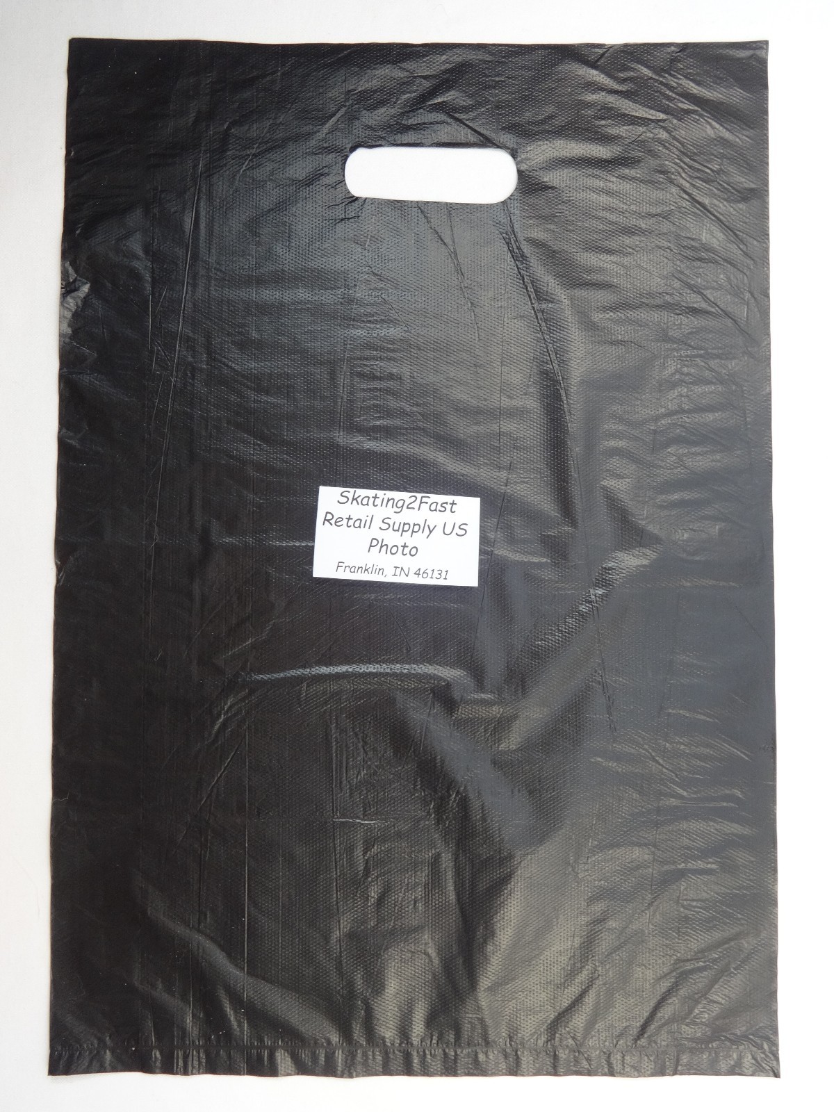 500 Qty. 12″ x 3″ x 18″ Black High-Density Plastic Merchandise Bag w / Handle