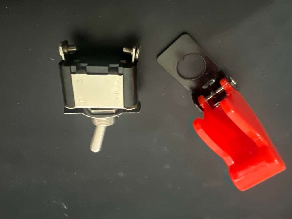 Pilot Automotive Performance Toggle Switch with Red Safety Cover