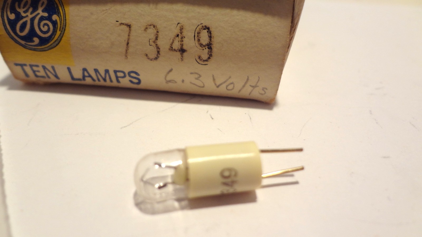 GE LAMPS # 7349 BOX OF (9EA) 6.3VOLT, 1. WATT MINATURE PIN BASE**NEW**