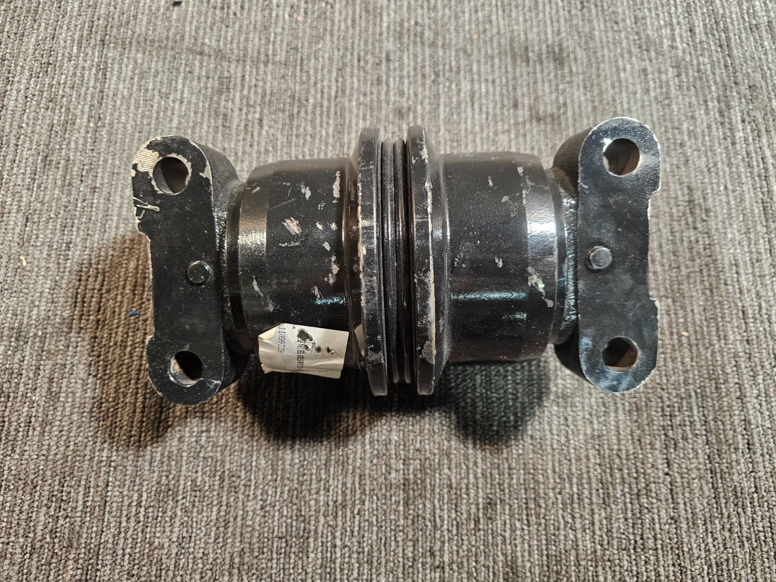 Sany 11899729 Carrier Roller, Black Powder Coated Finish