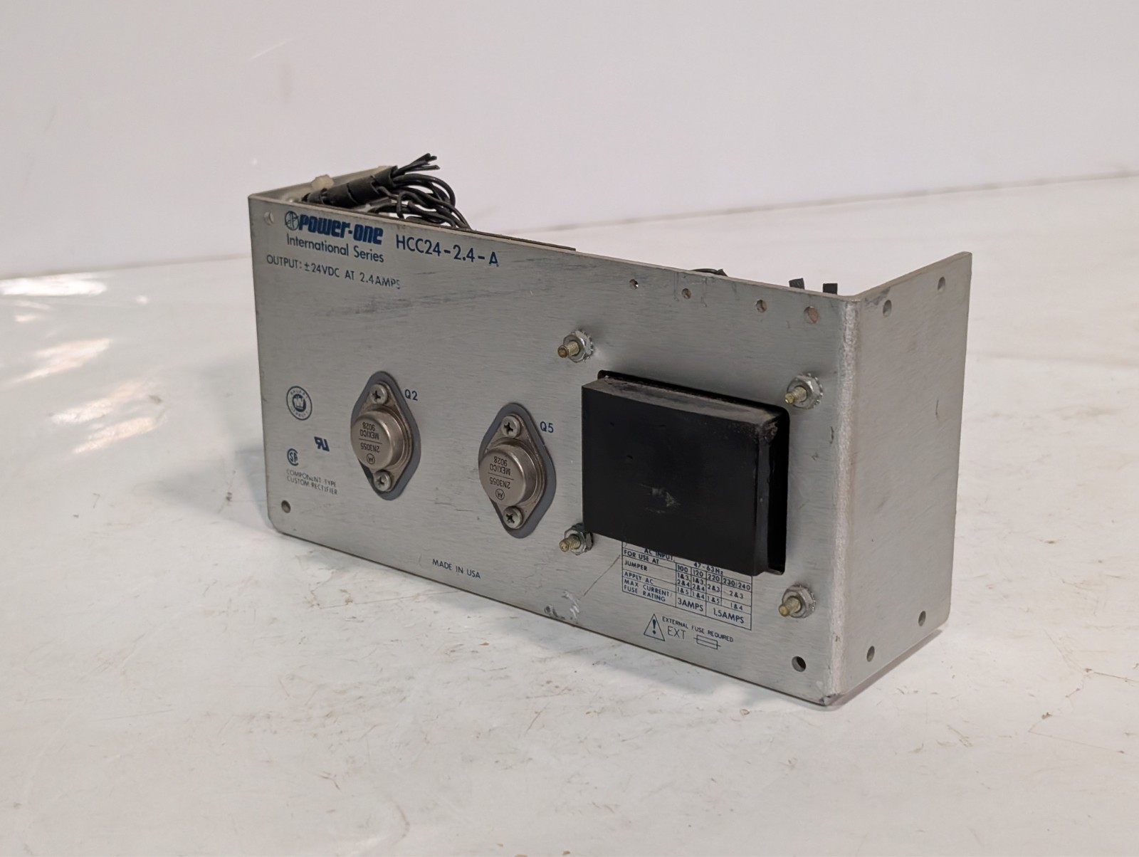 Power-One HCC24-2.4-A linear power supply +/-24VDC 2.4A, 100-240VAC as shown