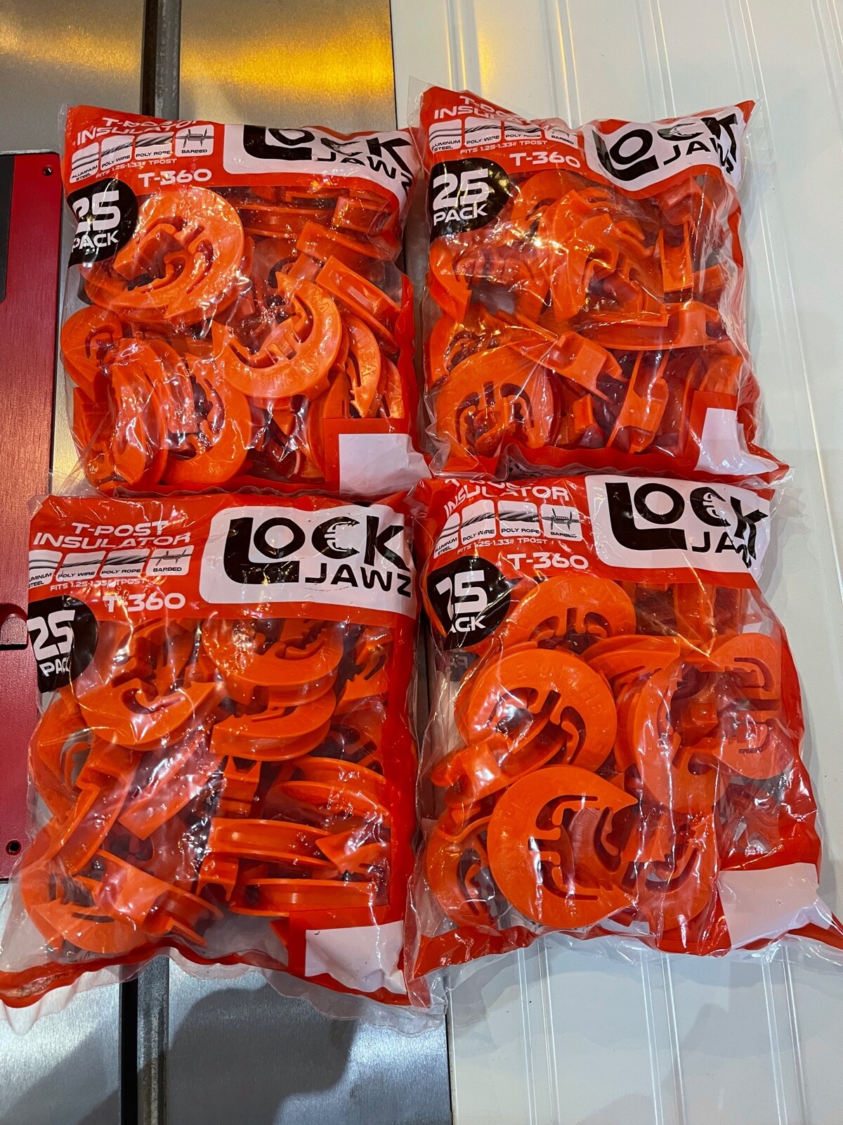 LockJawz Electric Fence T Post Insulators (25)pk – Orange (T-360)