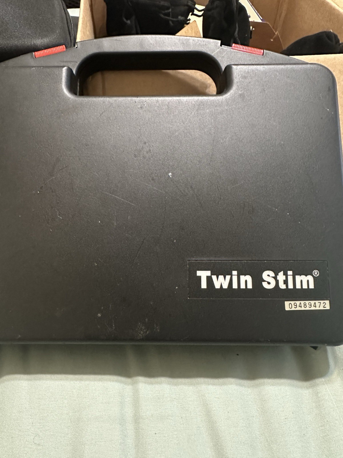 Twin Stim TENS/EMS Unit Handheld with Electrodes and Accessories