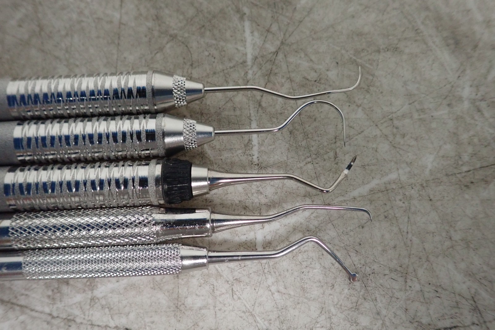 (5) Hu Friedy Dental Instruments EXD11/126, EXTU17/236, S204S7, SAS 1/24, GCPYD1