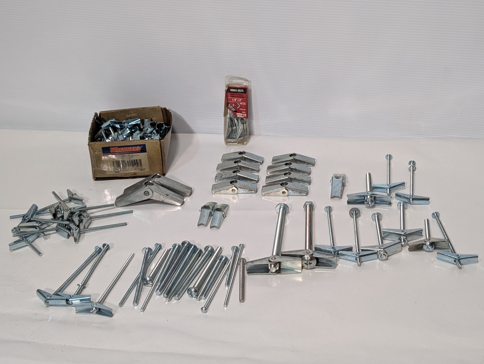 Large Lot of Assorted Sized Hollow Wall Mounting Toggle Bolts Pre-Owned as shown