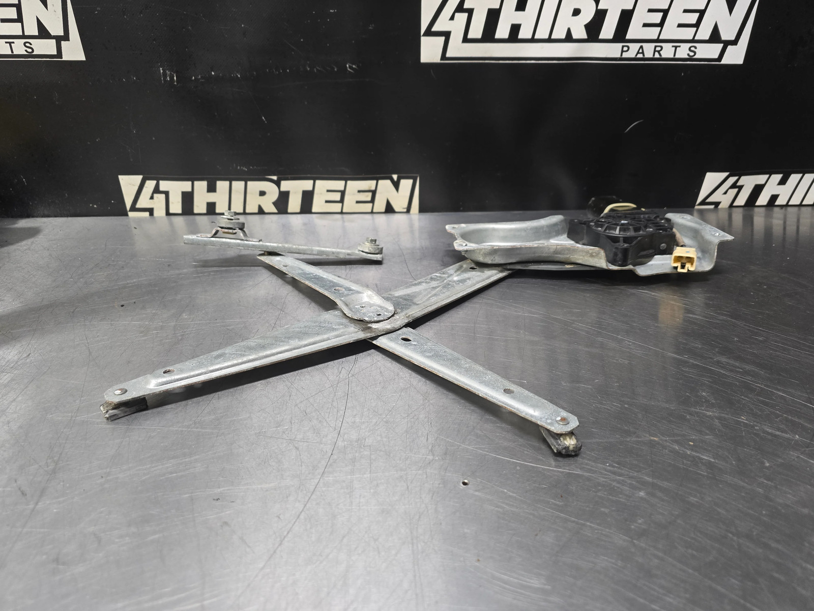 2004-06 GTO DRIVERS SIDE LH WINDOW REGULATOR ASSEMBLY W/ MOTOR – OEM #N12