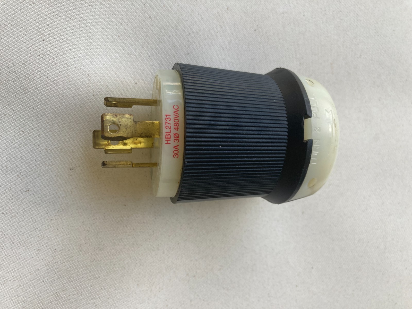 Hubbell HBL2731 Locking Plug – Black/White 1 piece. Used once for testing system