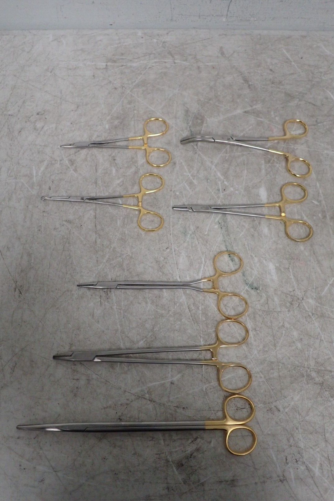 (7) Symmetry 32-410 Needle Holder, Miltex 72-10 TC Gripper, gS 13.7520 Scissors