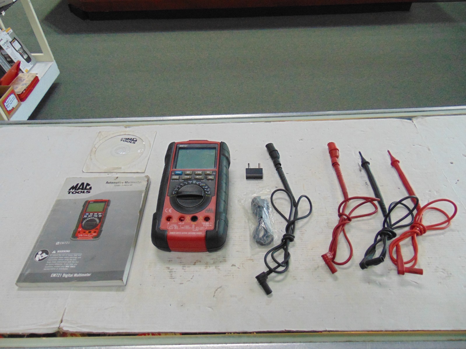 Mac Tools EM721 Digital Multimeter + Backlight, Carry Case, Leads, Book & Disc