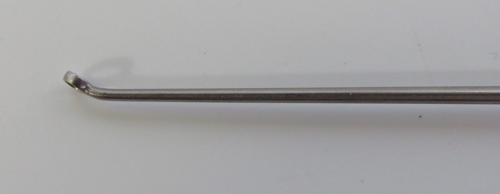 Aesculap OF356R Buck Ear Curette 6″ Curved Blunt Fig. 0 Outer Diameter – 2mm