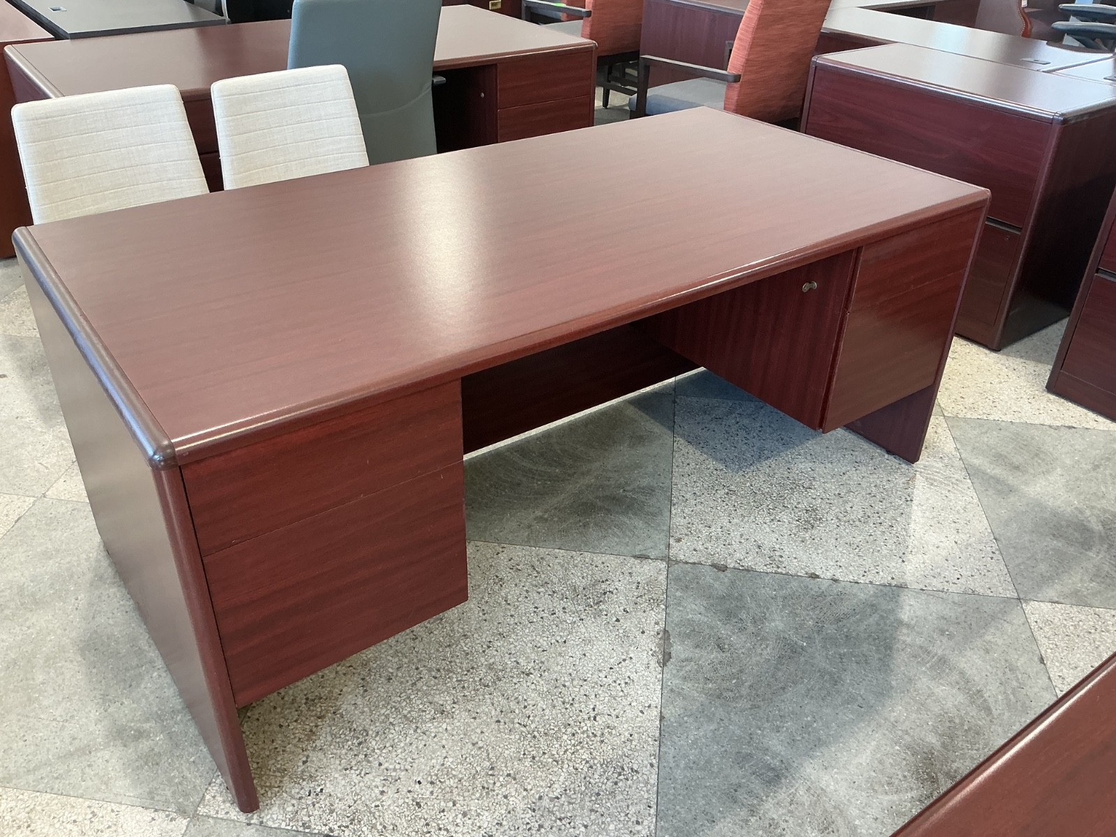 6’W x 3’D executive double pedestal desk by OFS in Mahogany Laminate