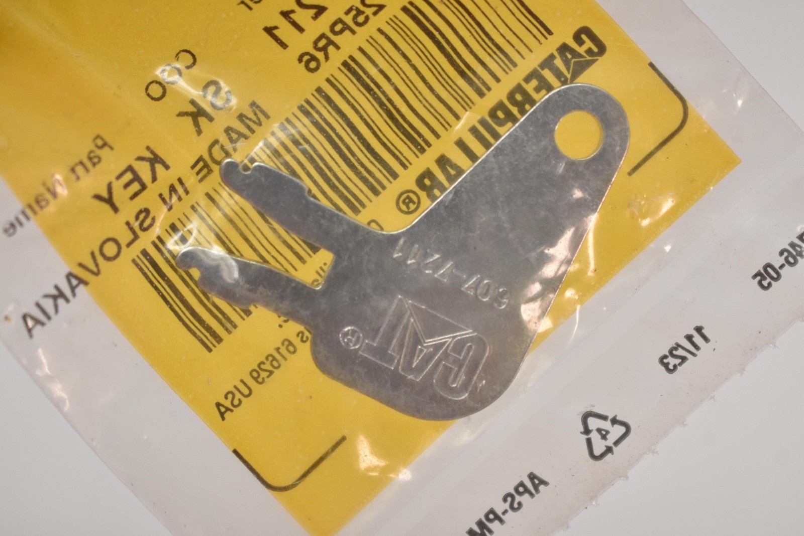 Caterpillar 607-7211 SK Key Silver Made In Slovakia CAT Equipment Part OEM