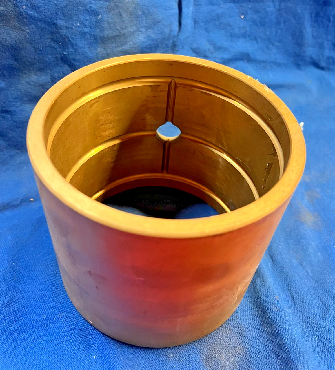 BRONZE BUSHING WITH OIL GROOVES O.D. 4-1/2″ I.D. 3-7/8″ 101332, HOLE 5/8″ DIA.