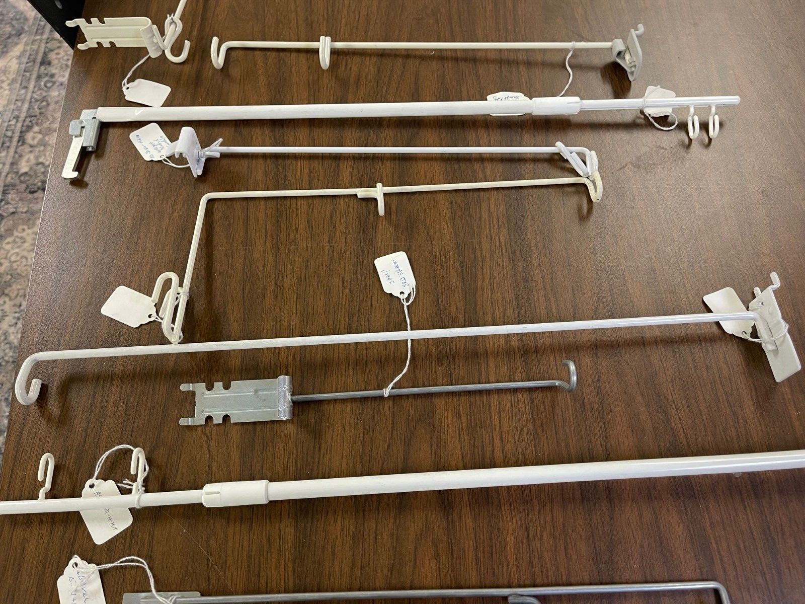 9 pieces Misc. Retail Shelving Metal Hardware- Flag Sign Holders
