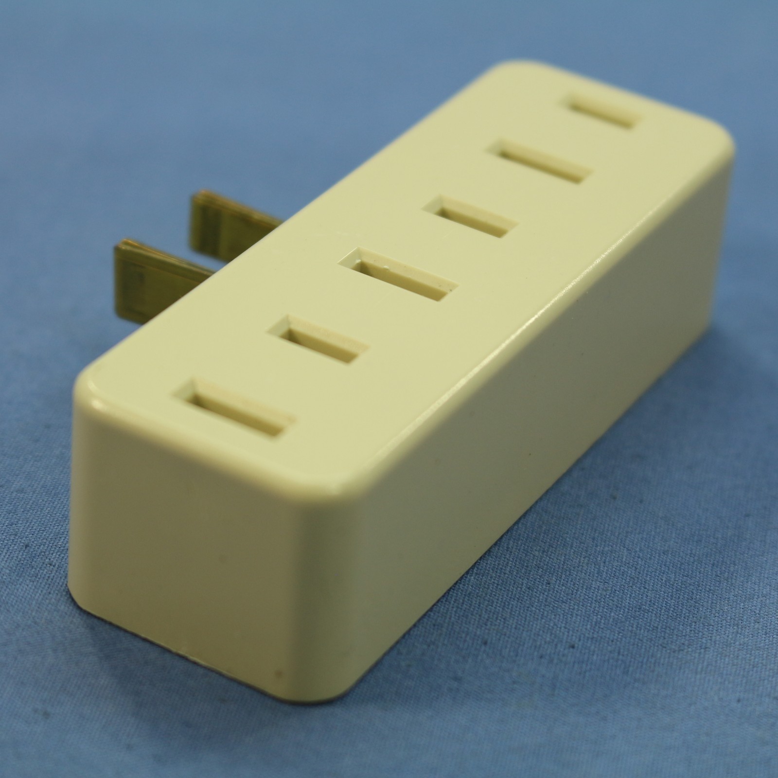 Leviton Ivory Polarized Plug-In Triple Tap Outlet Adapter NEMA 1-15R 15A 65-I