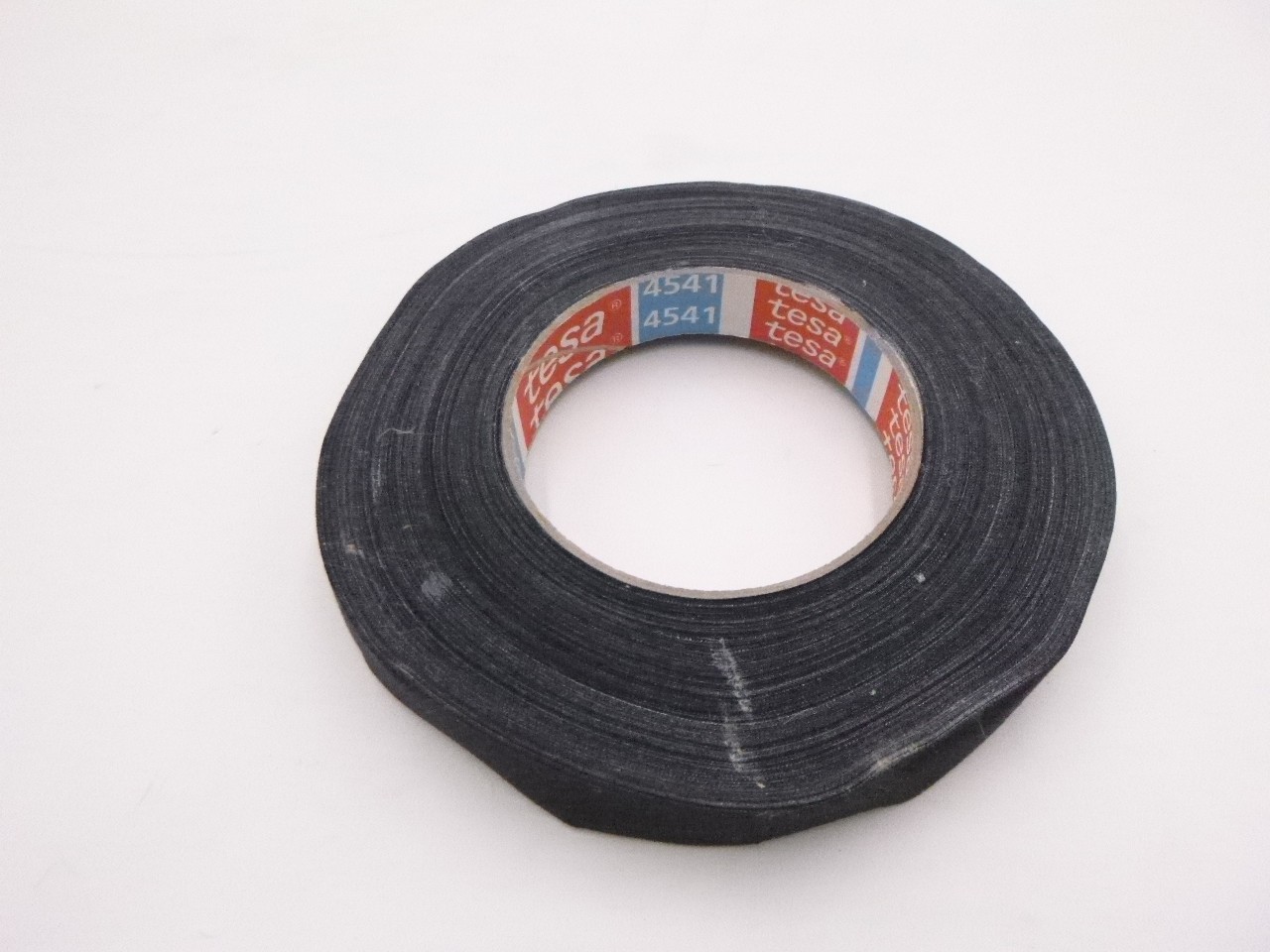 3/4″ x 55 yds. Tesa Conformable Uncoated Cloth Tape Black 4541