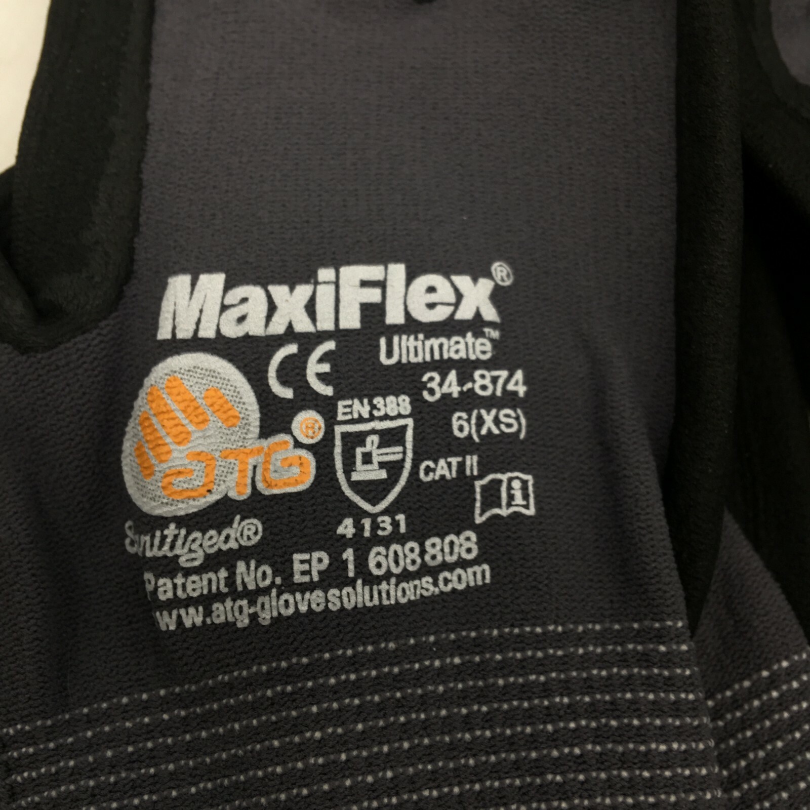 MaxiFlex 34-874 Seamless Knit Nylon Glove with Nitrile Coated Micro-Foam Grip XS