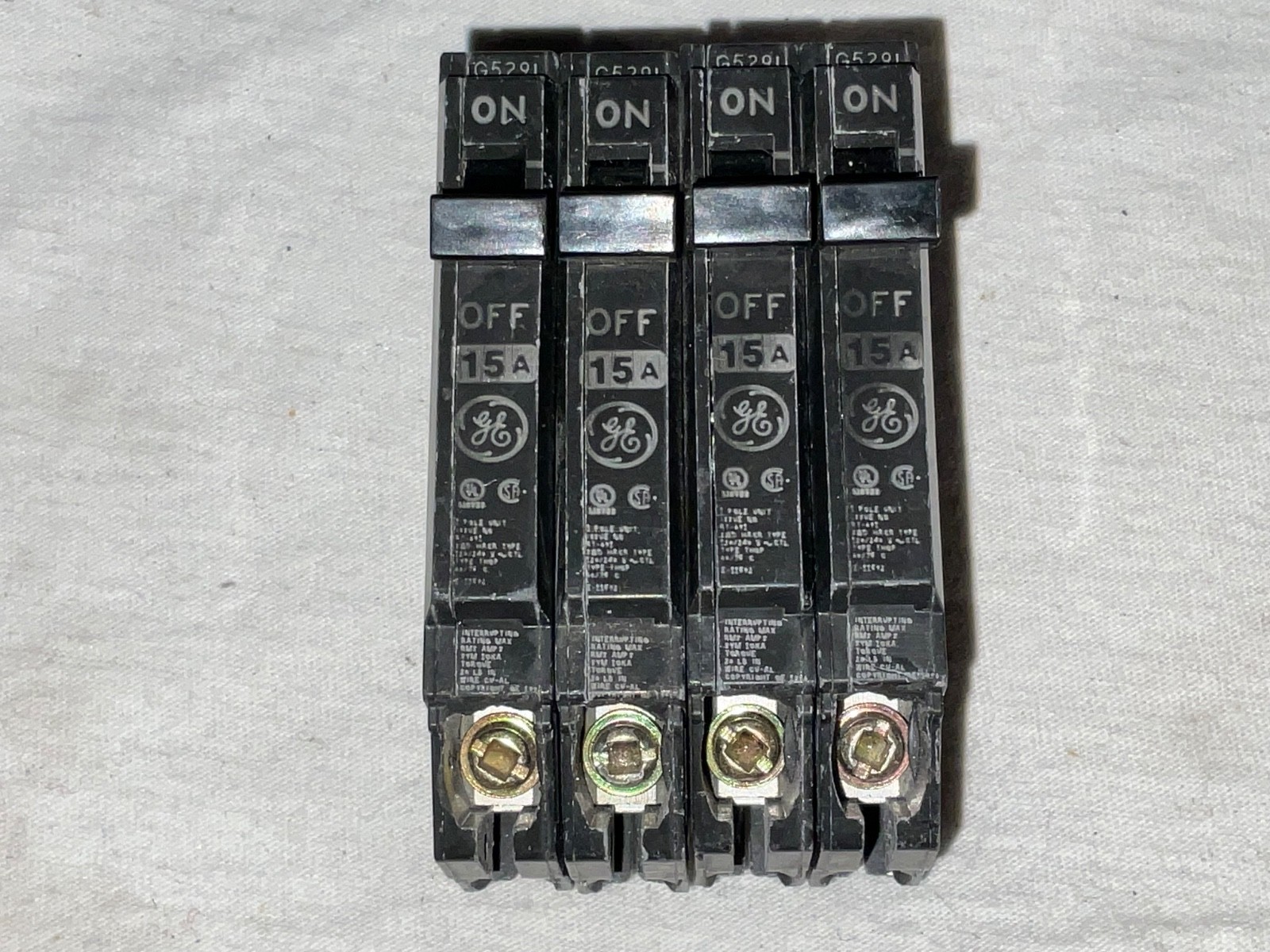 LOT OF 3 THQP115 GE THQP 1 pole 15 amp plug in 120v Circuit Breaker USED
