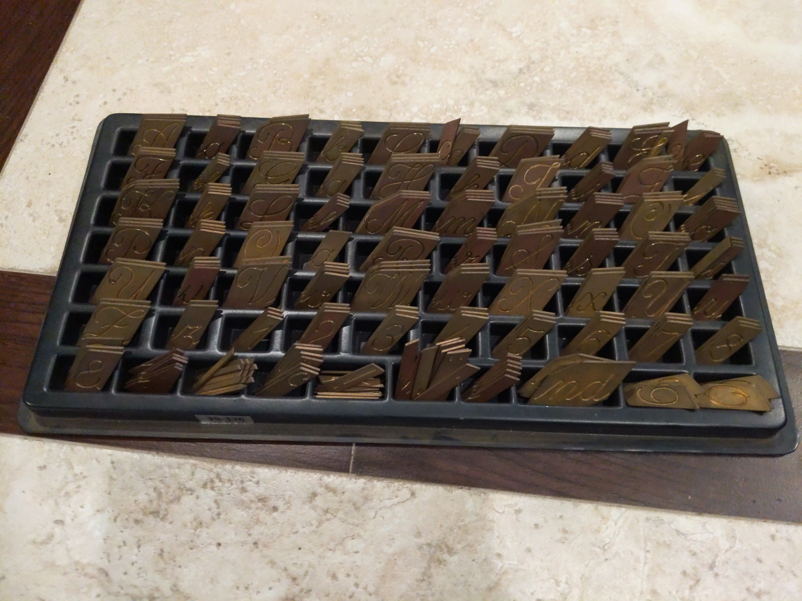 Complete Set of Brass Unknown Brand/Model Cursive Font Engraving Type