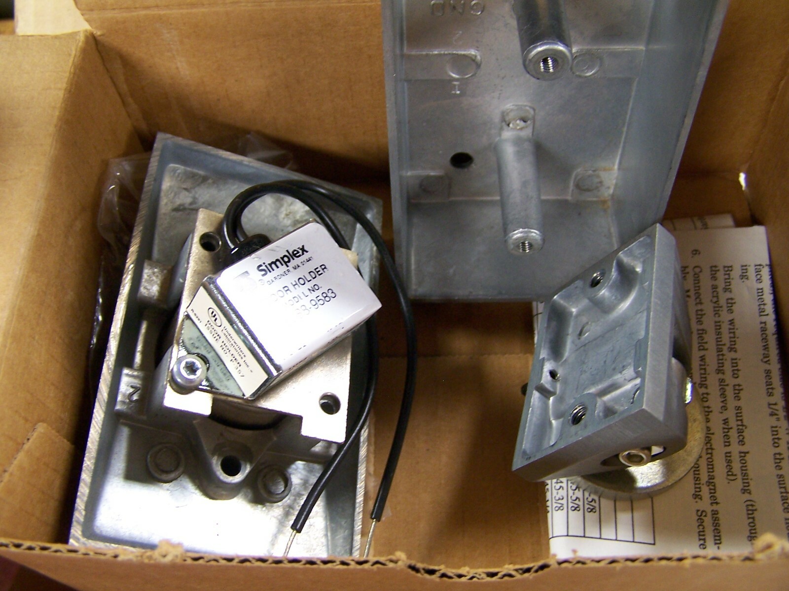 NEW SIMPLEX ELECTROMAGNETIC DOOR HOLDER SURFACE WALL MOUNTED 120 VAC 2088-9583