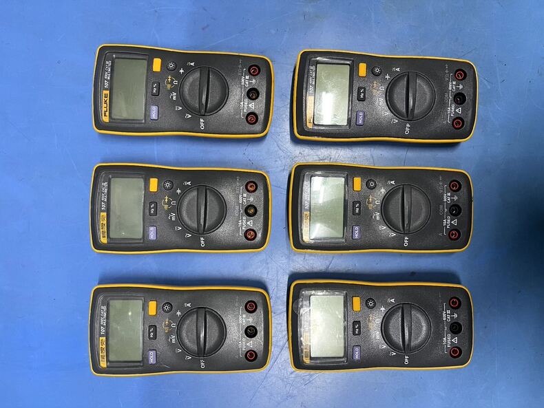 1PC Used Fluke 107 Handheld Digital Multimeter AC/DC Current Tester #W