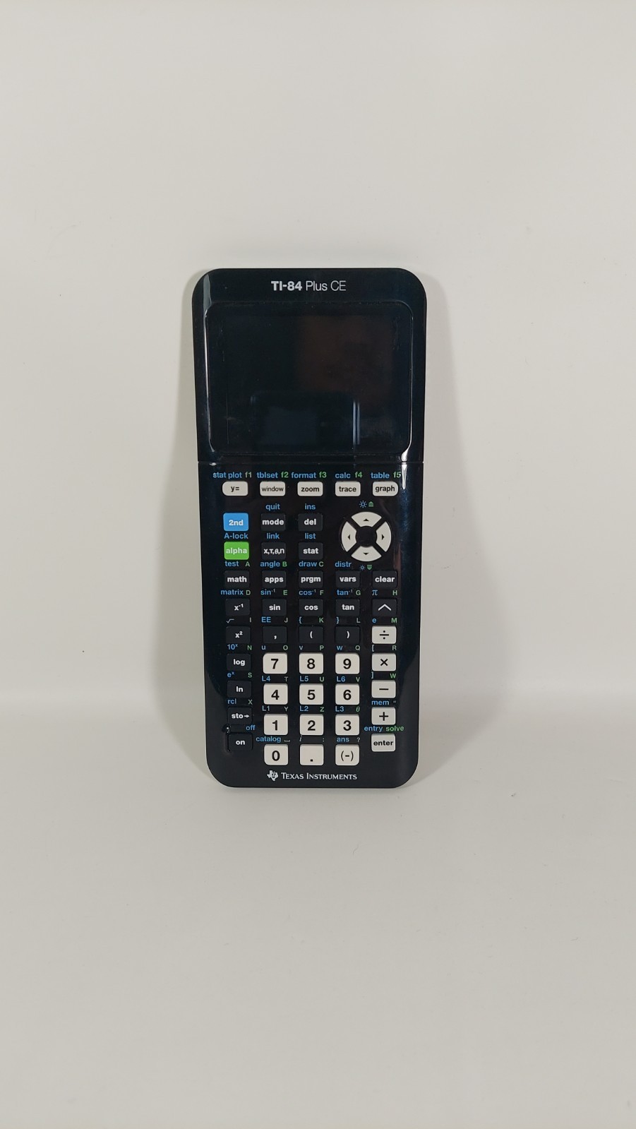 Texas Instruments Ti 84 Plus Ce Graphing Calculator with a charger cable
