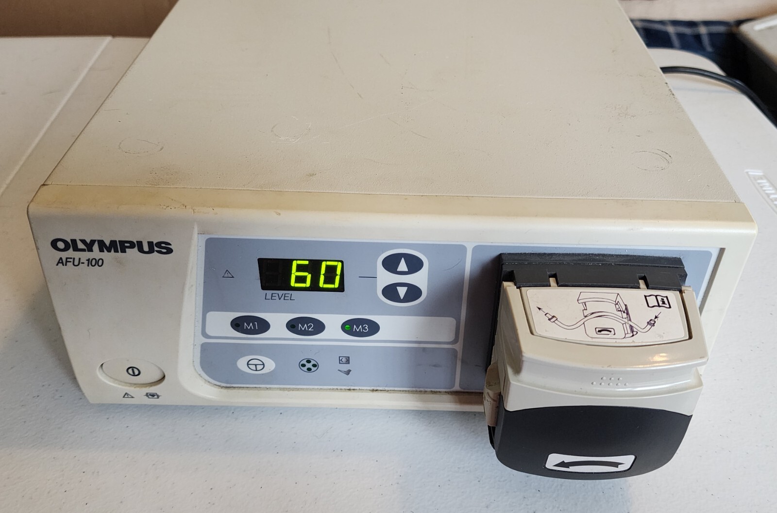 Olympus AFU-100 Endoscopic Flushing Pump «this unit powered up and sold as is»