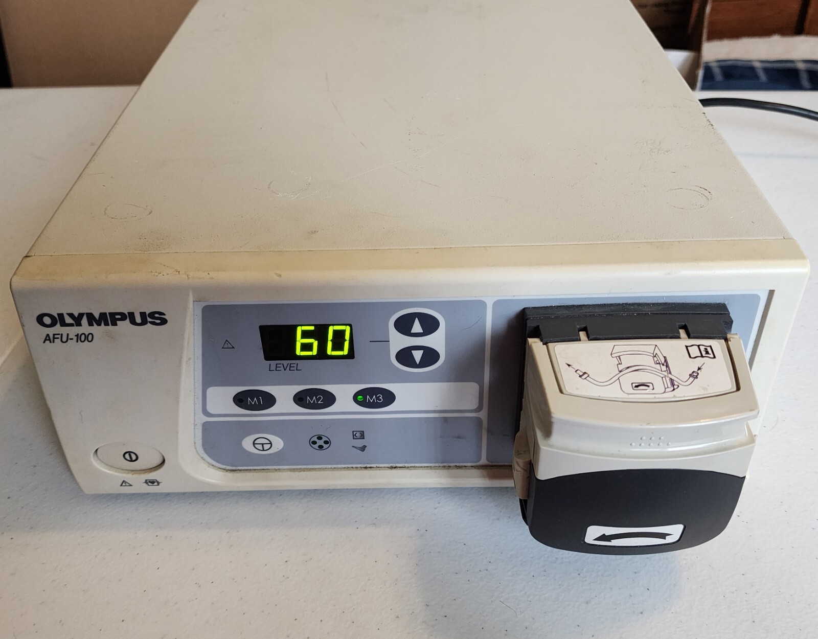 Olympus AFU-100 Endoscopic Flushing Pump «this unit powered up and sold as is»