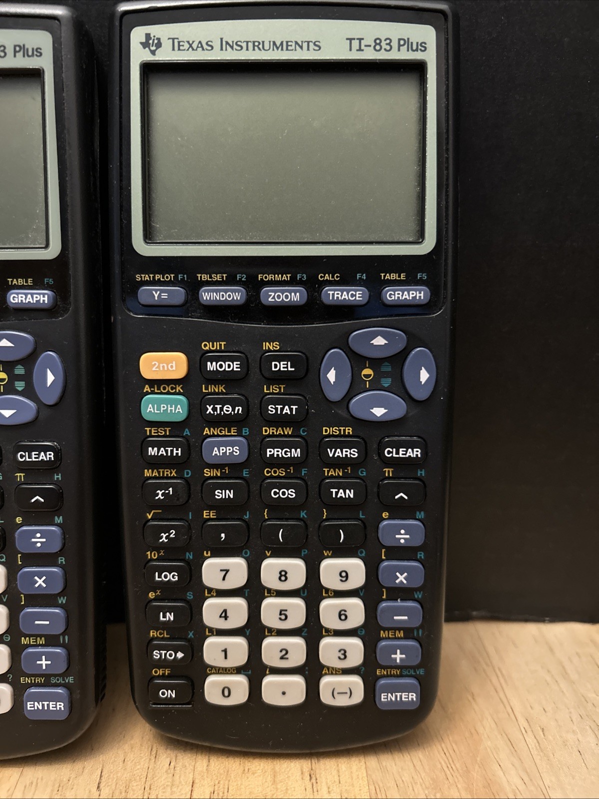 (For Parts) Lot of 2 – Texas Instruments – TI 83 & Plus Calculators