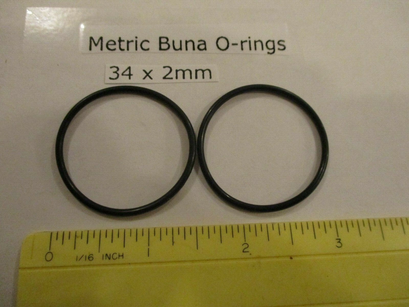 34mm ID x 38mm OD x 2mm thick O-ring. Buna-70. Quan 2.
