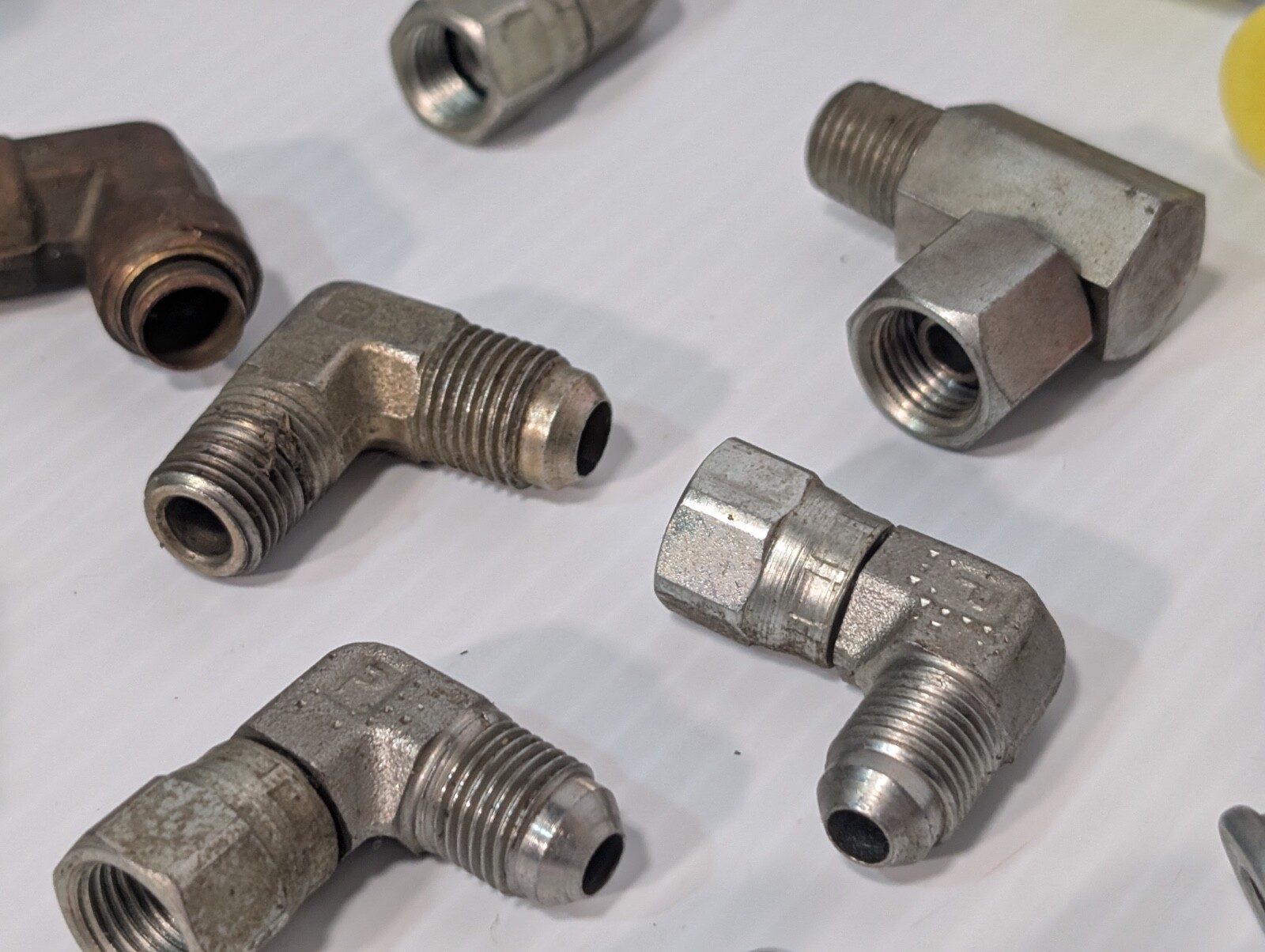 Mixed Lot of Female & Male Swivel Nut Elbow & Industrial Plug Fittings, as shown