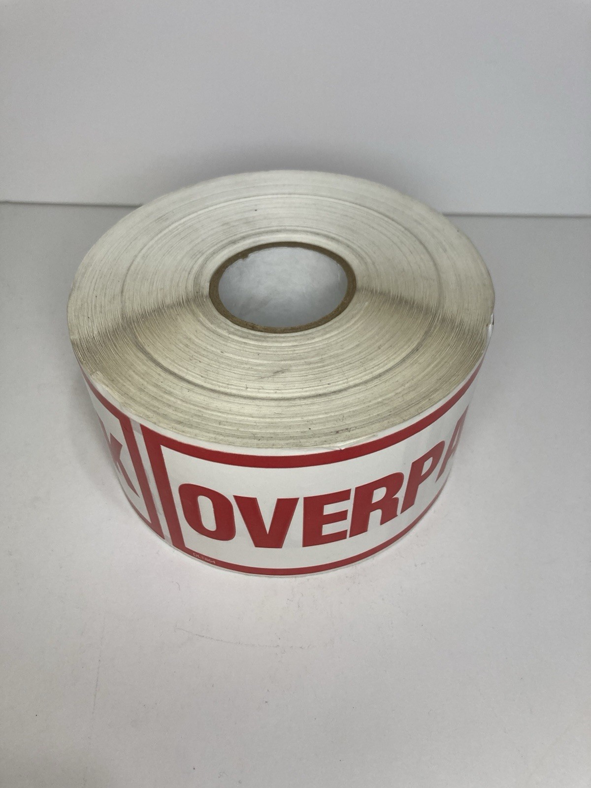 Roll of 500 OVERPACK Labels 2.5″ x 6″