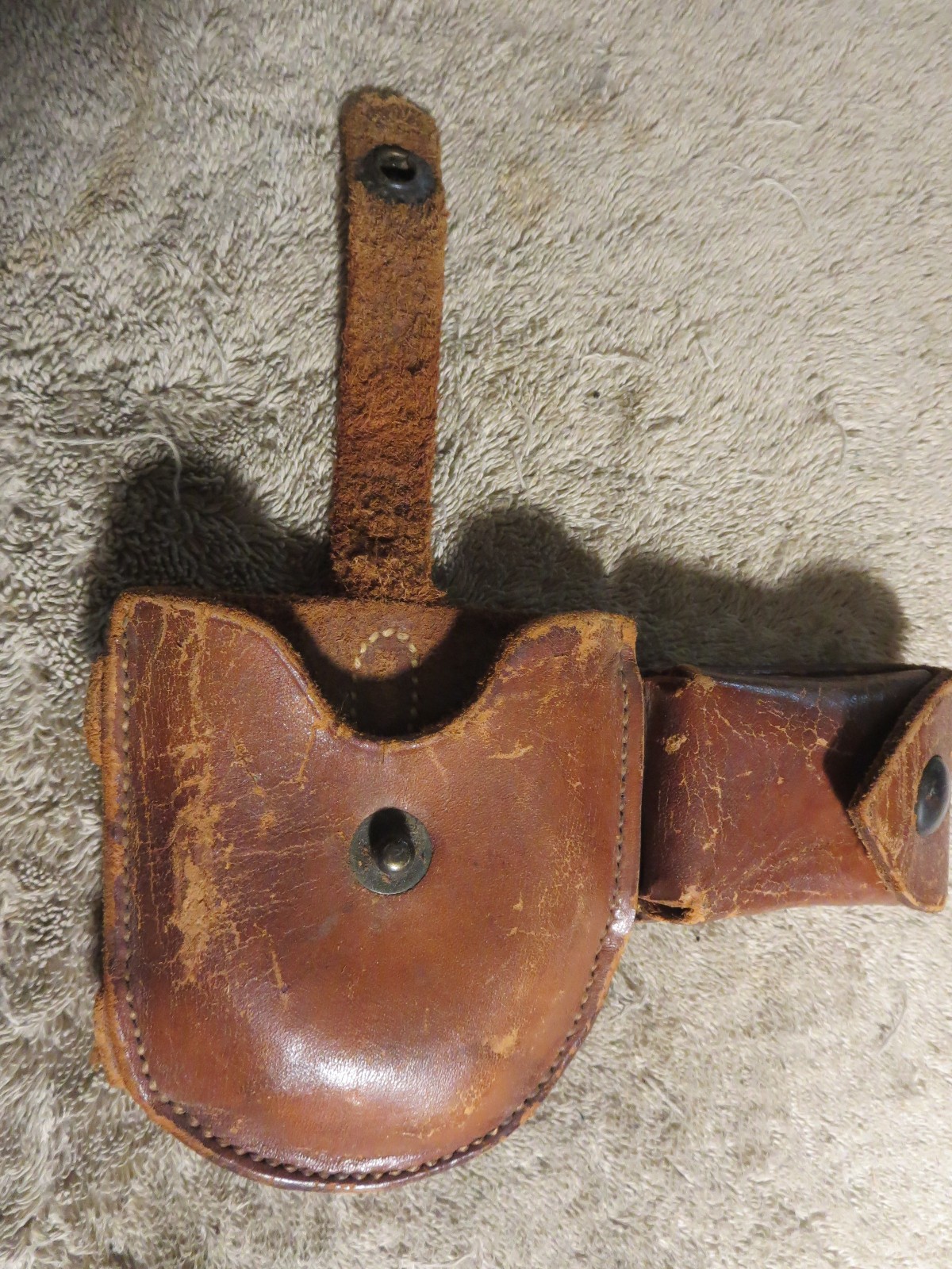 4 handcuff cases: 3 brand names in excellent cond. 1 older, modified, no name.