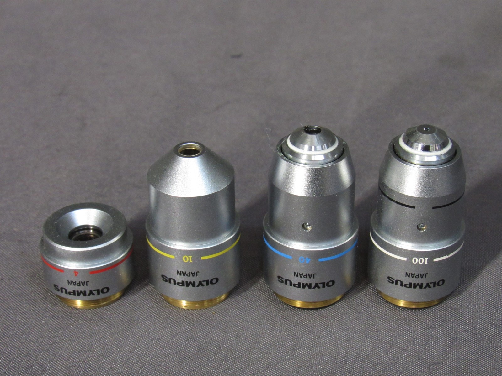 * Lot of 4 Olympus CH-Series Microscope Objectives; 4x 10x 40x 100X