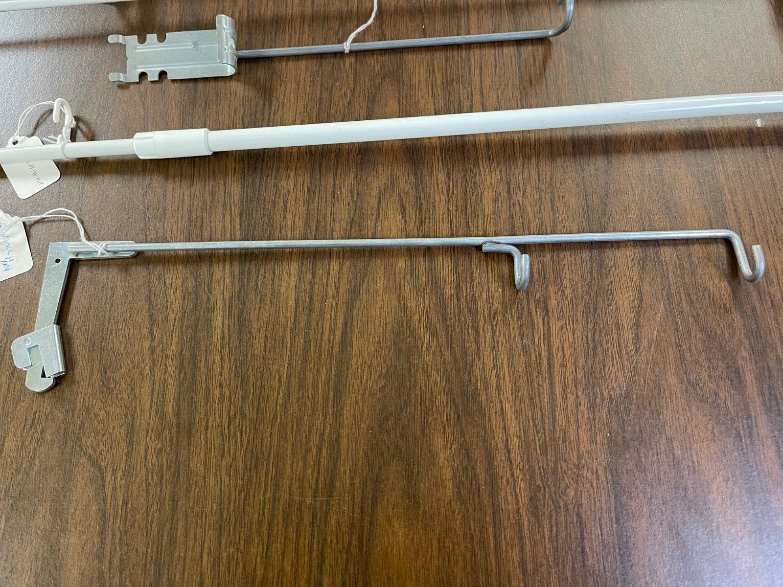 9 pieces Misc. Retail Shelving Metal Hardware- Flag Sign Holders