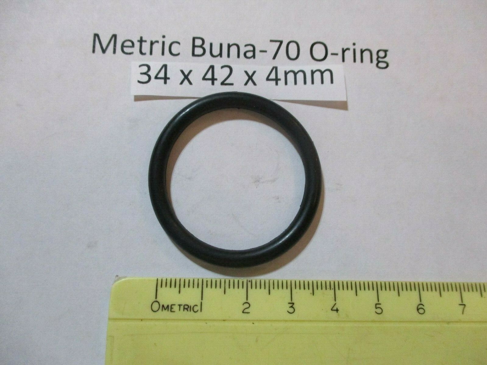 34mm ID x 42mm OD x 4mm thick O-ring. Buna-70. Quan 1.