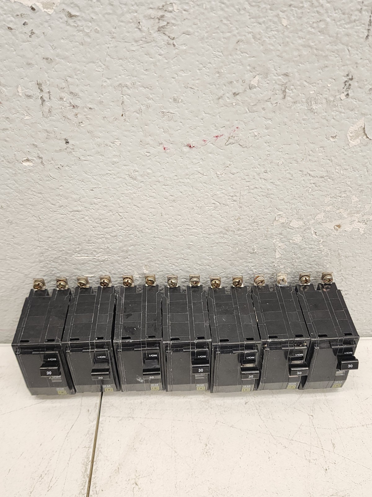 (7) Square D QO230 2-Pole 30 Amp 120/240V Plug-In Breaker Yellow D Trip Window