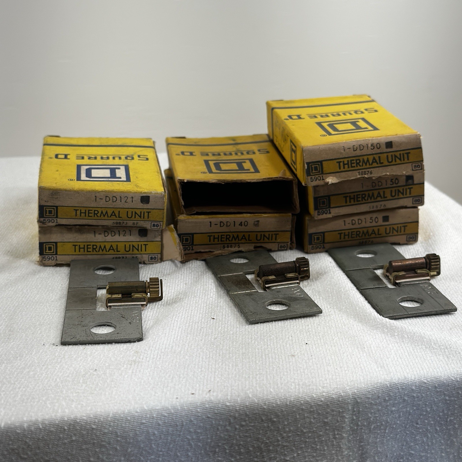 LOT OF 7 NEW SQUARE D OVERLOAD RELAY THERMAL UNITS 1-DD121, 1-DD140, 1-DD150