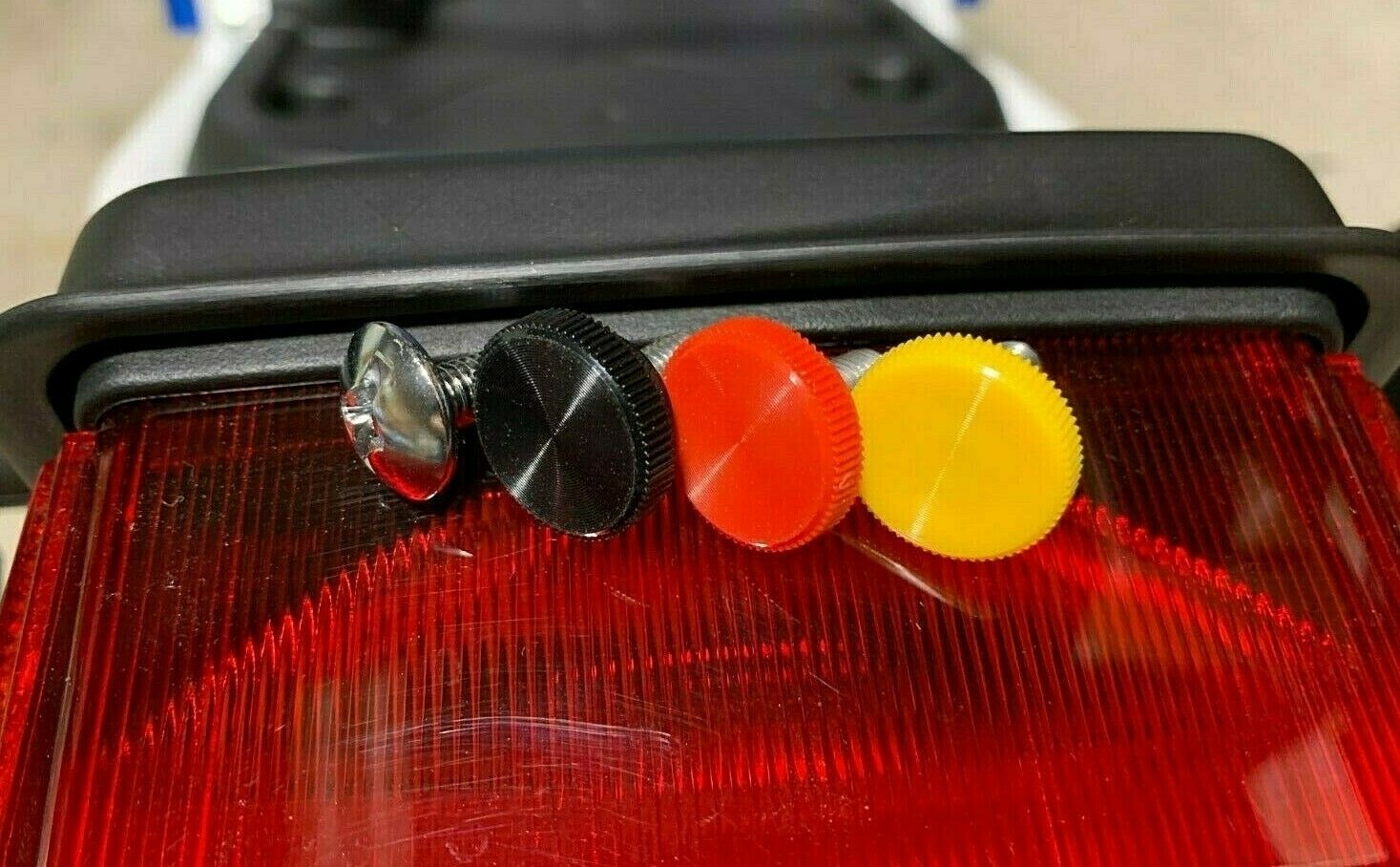 Honda Ruckus Underseat Stainless Steel Cubby Thumb Screw in Red, Yellow or Black