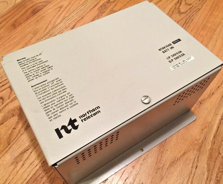 NORTHERN TELECOM NTAK76AB BATTERY BACKUP UNIT 54V 9AMP *NO BATTERIES* Case Only