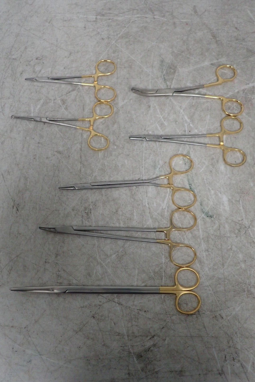 (7) Symmetry 32-410 Needle Holder, Miltex 72-10 TC Gripper, gS 13.7520 Scissors