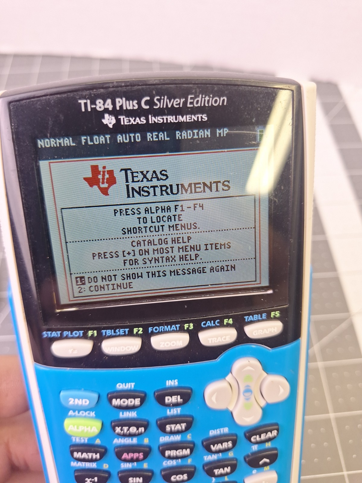 Texas Instruments TI-84 Plus C Silver Edition Graphing Calculator With Cord