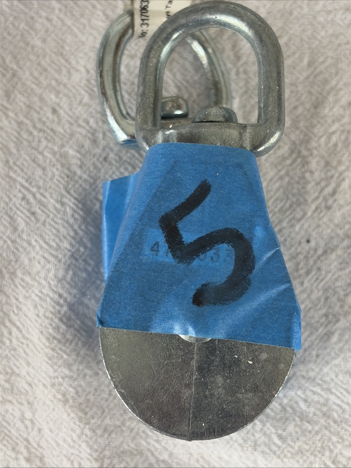 Two Swivel Pulleys for Use with Rope. See Photos for Size Specifics Provided.
