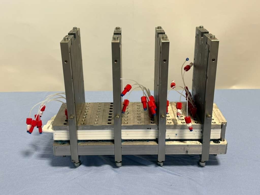 Multi-Plate Electrochemical Test Fixture for Flow Battery Fuel Cell Stack