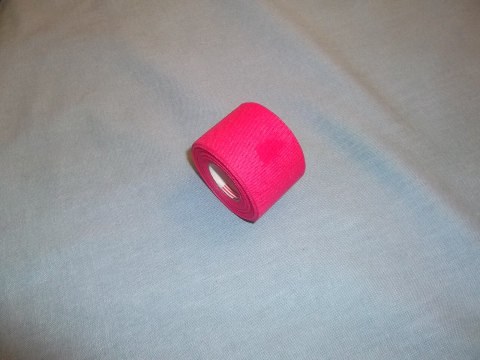 HOT PINK CLOTH MEDICAL TAPE 1 roll 1.5″x15yds. * SECONDS *