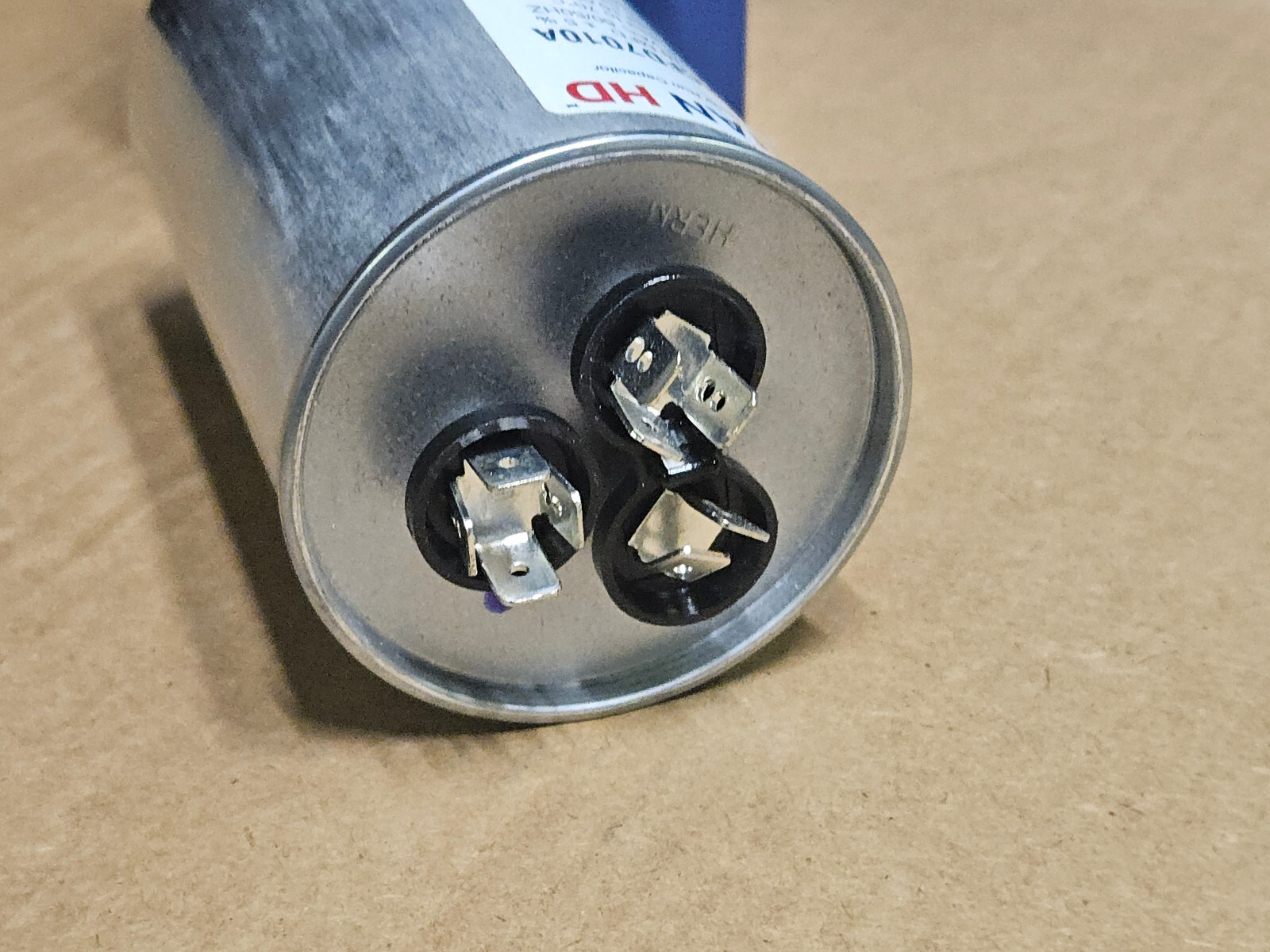 TITAN HD Motor Dual Run Capacitor: Round, 440/370V AC, 70/10 mfd, 4 13/32
