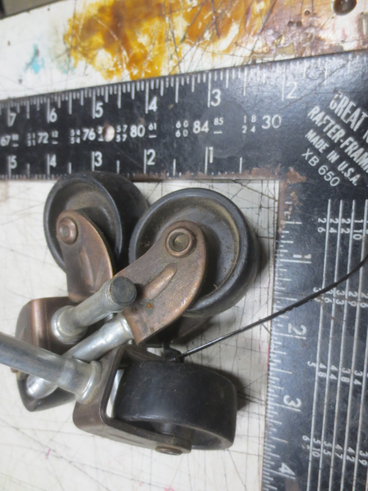 Vintage Set of 4 Black plastic / nylon Casters – Copper tone metal